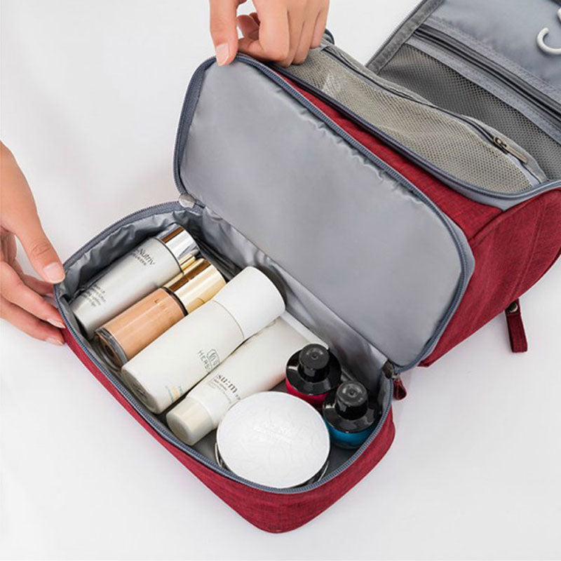 Compact and durable hanging toiletry bag. Ideal multi-compartment travel case for all your essentials.