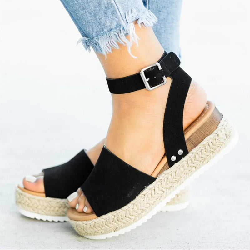 Leopard print Leona high heel sandals for women. Zipper, peep toe, and comfortable block heel.
