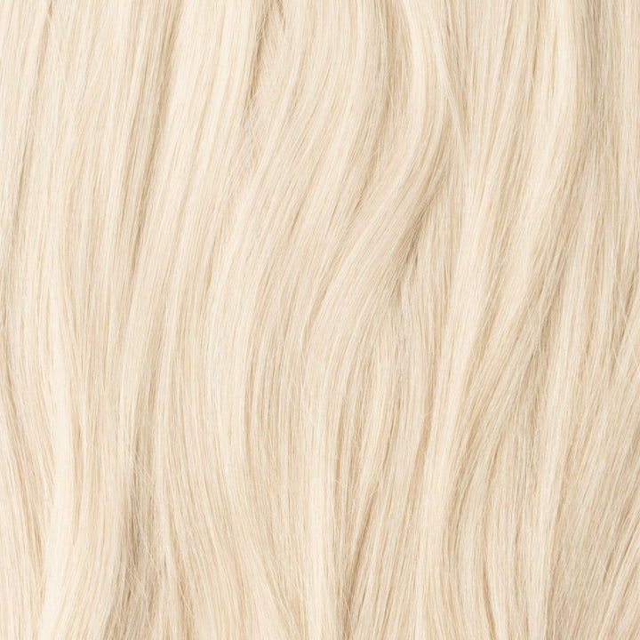 Sorella Light Ash Blonde 60B clip-in human hair extensions, perfect for added length & beauty.