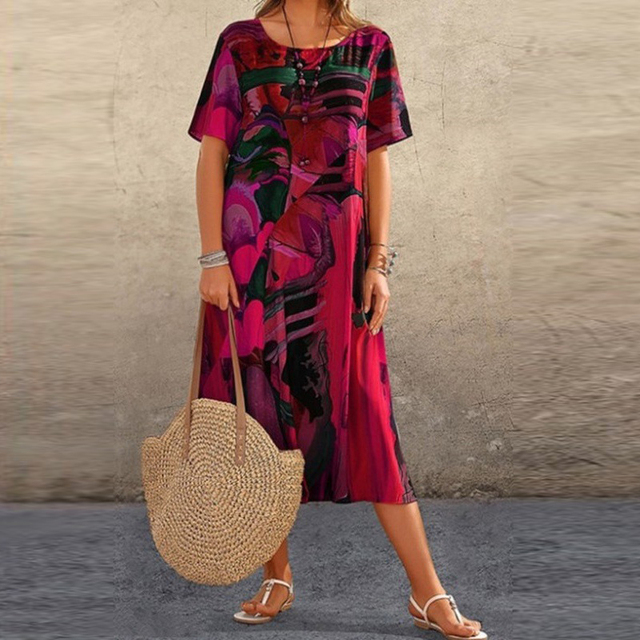 Casual women's short sleeve midi dress, light & loose for comfortable summer day wear. Effortless vacation fashion.
