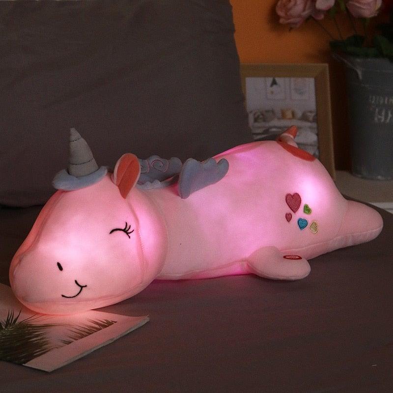 Light-up velvet unicorn plush toy with colorful LEDs, perfect as a kids night light or fantasy decor.