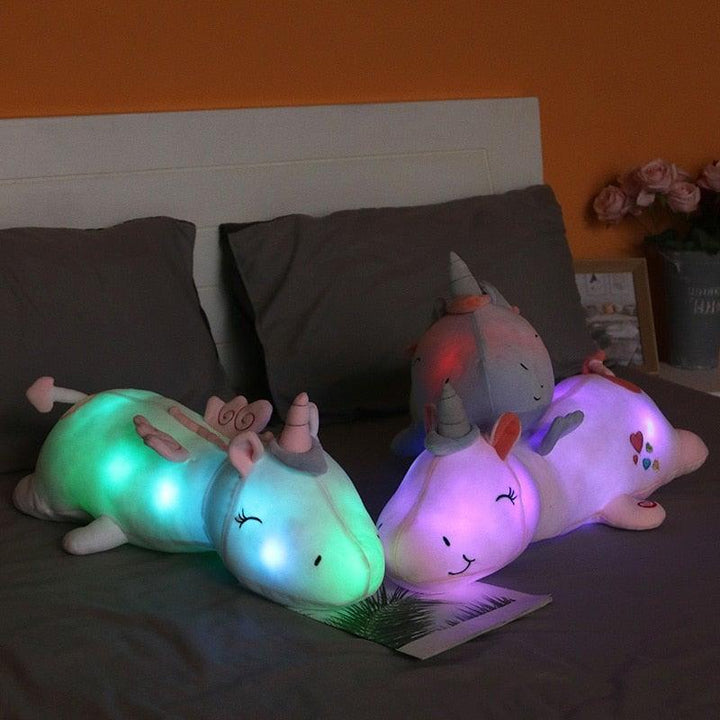 Kids gift: LED light-up unicorn plush with a soft, fuzzy texture, bringing magic to any room.