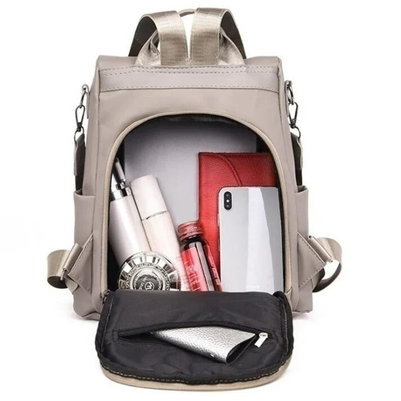Women's lightweight nylon backpack, easily transforms to shoulder or crossbody bag, ideal for daily use