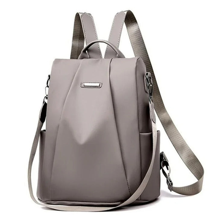 Versatile women's nylon backpack converts to shoulder bag & crossbody. Ideal for daily commute or travel.