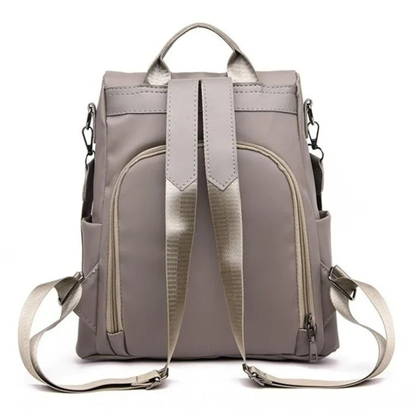 Durable water-resistant nylon women's backpack. Secure compartments for your everyday & travel necessities.