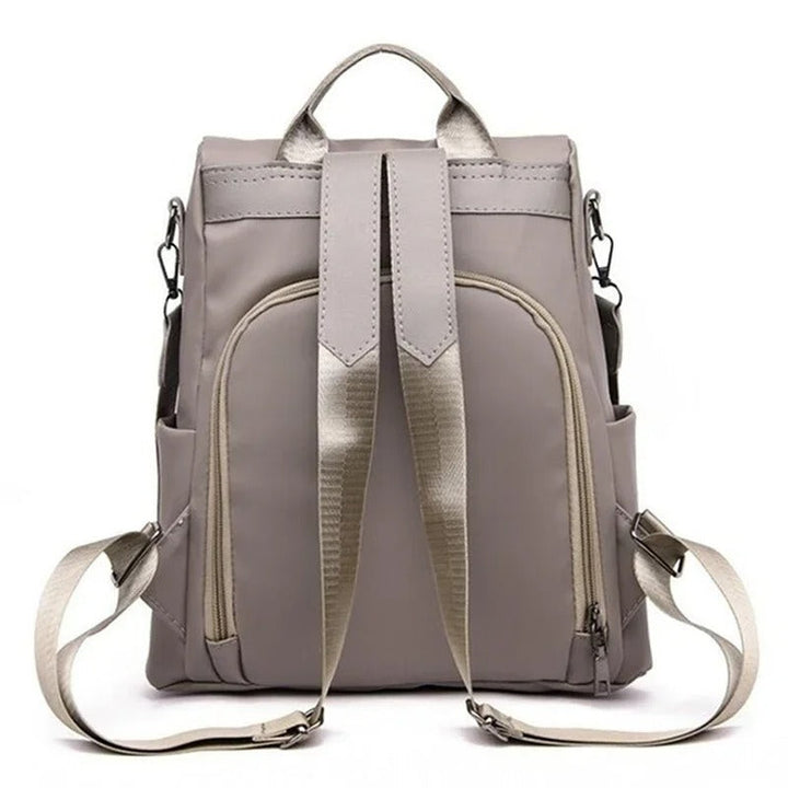 Durable water-resistant nylon women's backpack. Secure compartments for your everyday & travel necessities.