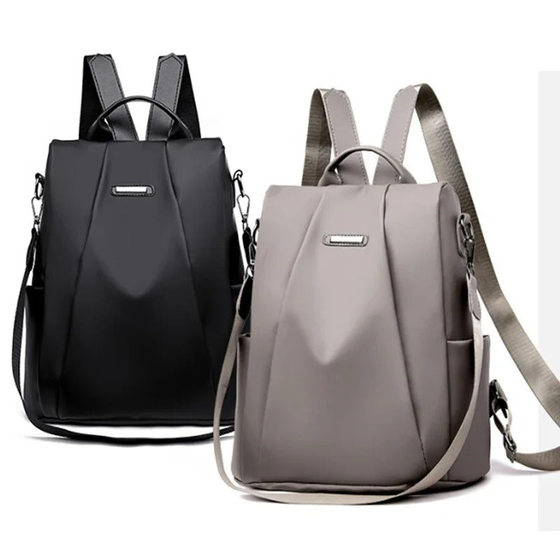 Stylish women's lightweight nylon backpack. Water-resistant for commuting, travel, & everyday adventures.