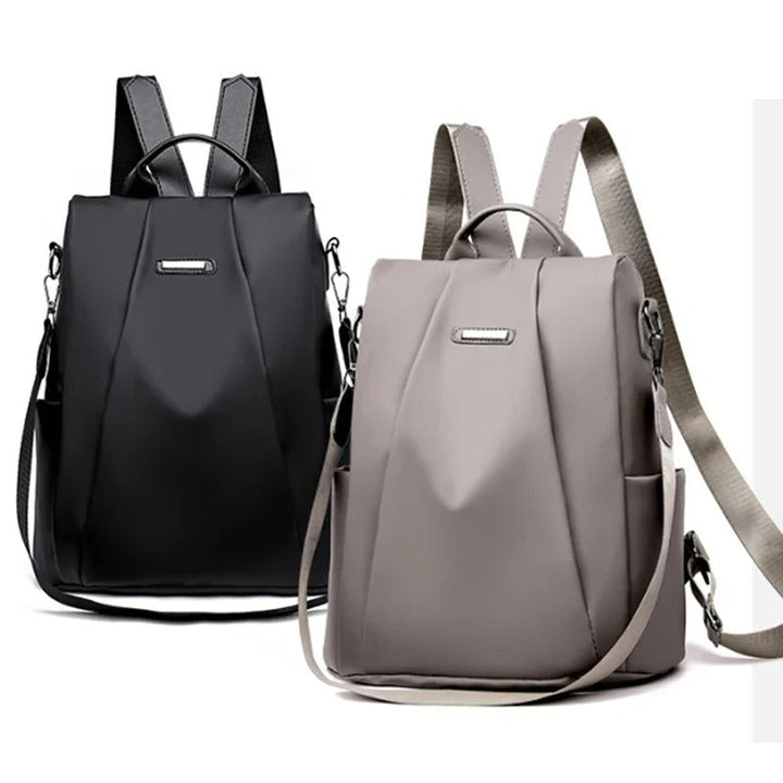 Stylish women's lightweight nylon backpack. Water-resistant for commuting, travel, & everyday adventures.