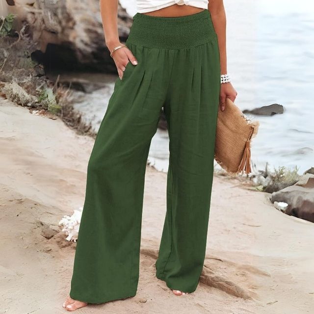 Elegant women's wide-leg linen blend trousers in a dark color, versatile for various casual occasions.