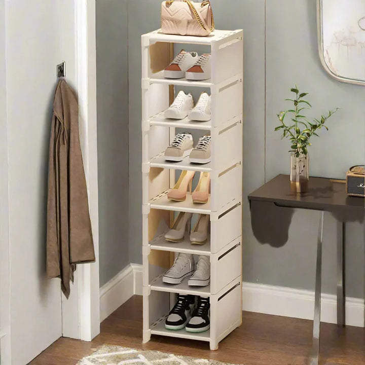 Liora space-efficient 8-tier shoe rack, black metal construction with fabric shelves, for shoe organization.