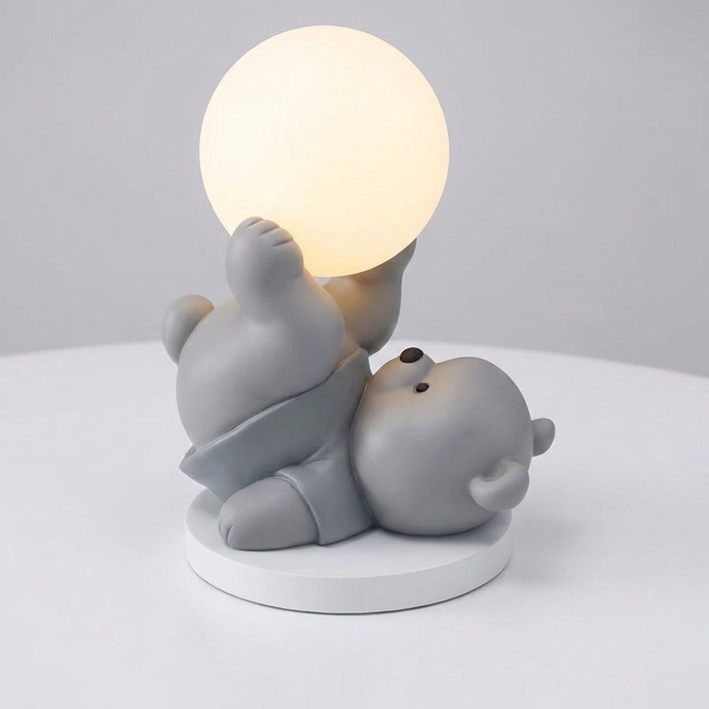 Detail of LumiBearo portable bear lamp, illustrating its compact size and durable design