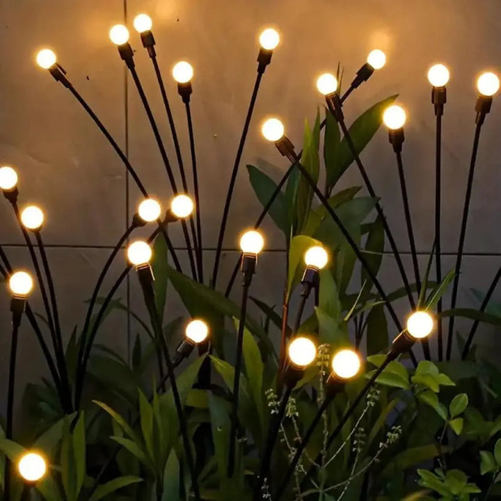 LunaGlow solar garden lights illuminating a pathway, eco-friendly LED landscape lighting for outdoor decor.