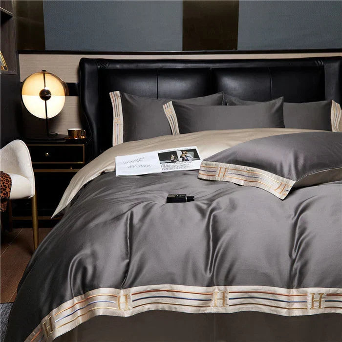Luxurious embroidered satin cotton bedding set for elegant bedroom comfort.