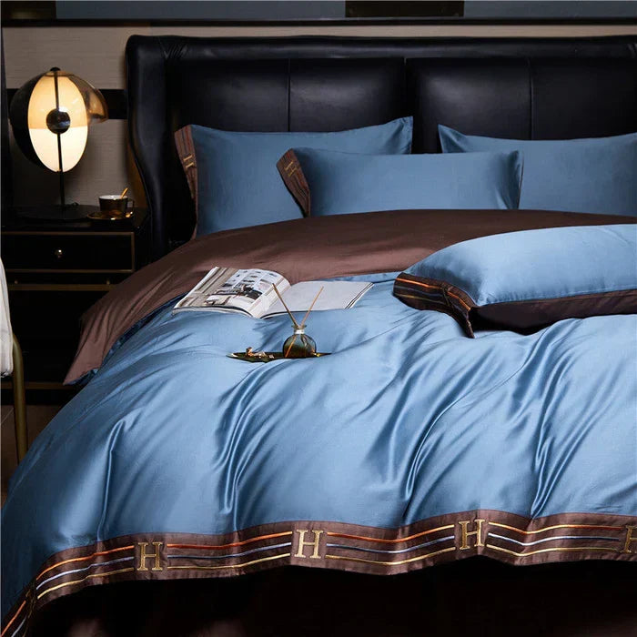 Smooth, opulent embroidered satin cotton bedding; soft to the touch for ultimate comfort.