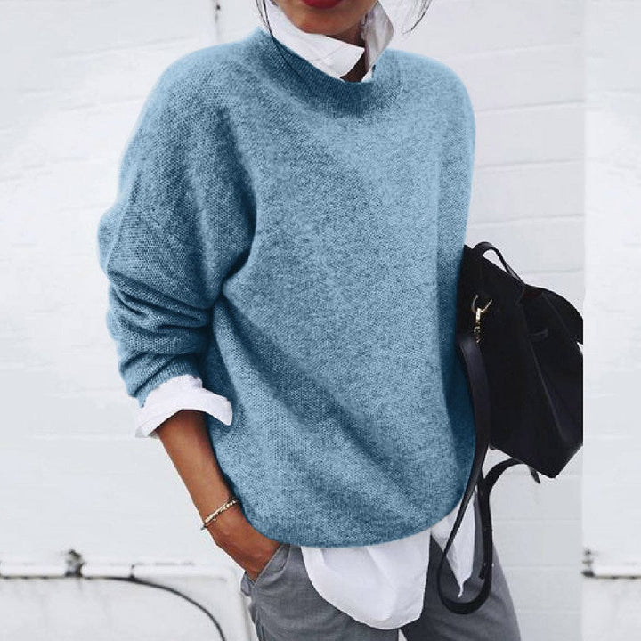 Elegant women's knitwear pullover, long sleeve soft top, perfect for versatile casual chic style.