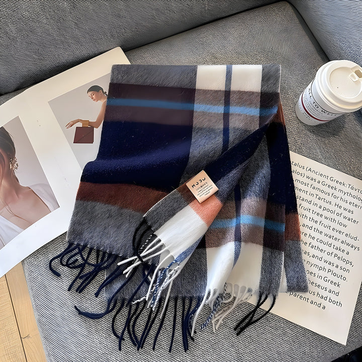 Women's soft plaid cashmere scarf, combining luxurious warmth with a versatile winter design.