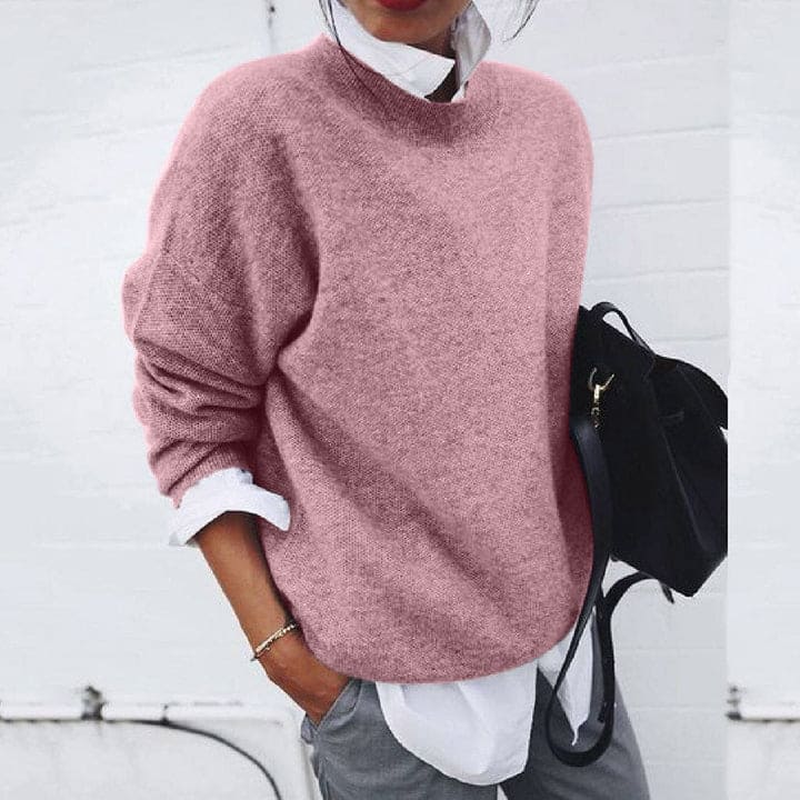 Stylish women's soft cashmere sweater, perfect for elegant winter fashion. Cozy long sleeve top for cold days.