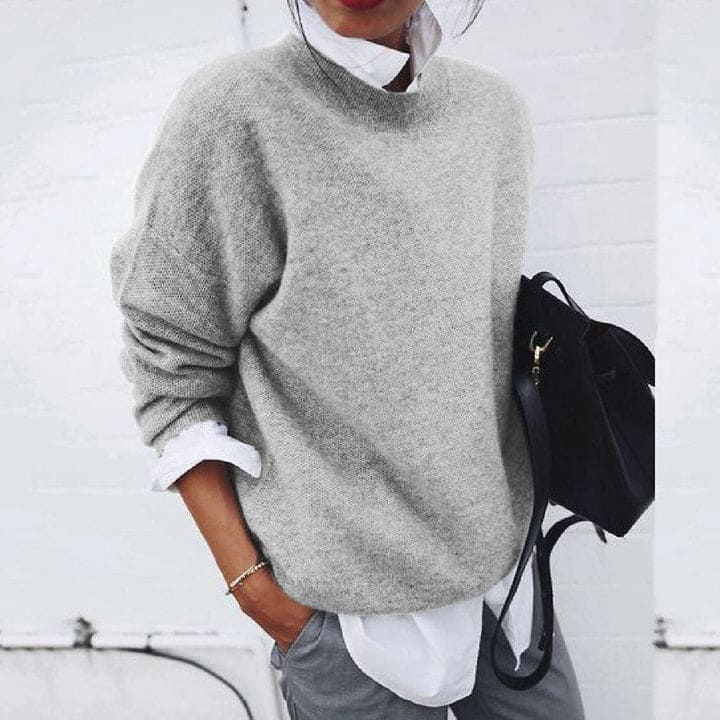 Cozy women's soft cashmere sweater. Comfortable long sleeve top for a luxurious feel, ideal for winter style.