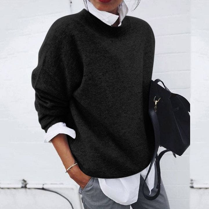 Elise women's soft cashmere sweater. Elegant long sleeve top, perfect for luxurious winter and fall fashion.