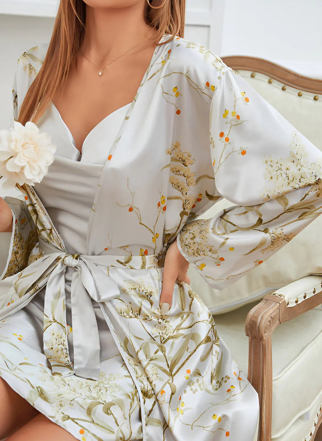 Elegant women's green satin robe and matching slip sleepwear set. Luxury two-piece nightwear.