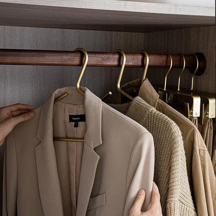Close-up: Anti-slip luxury metal hangers ensuring clothes stay put. Perfect for neat wardrobe organization.