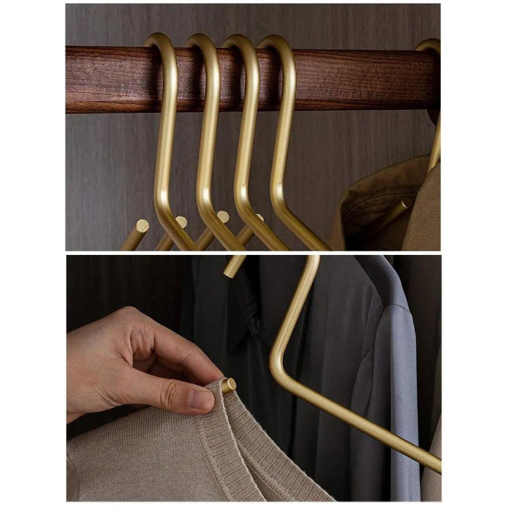 Sleek silver anti-slip metal hangers for modern closet organization. Durable premium garment storage.