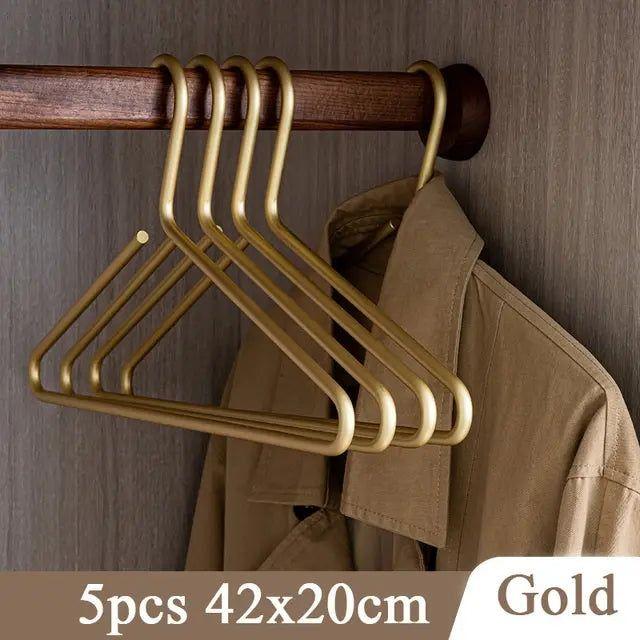 Premium anti-slip metal suit hangers, elevating wardrobe organization. Designed for luxury clothing care.
