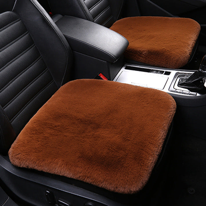 Cozy sheepskin seat cover, ideal for warming any car seat or adding luxury to your home.