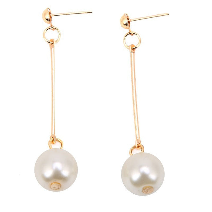 Chic women's fashion pearl drop earrings. Timeless luxury jewelry, an elegant gift for her, perfect for any occasion.
