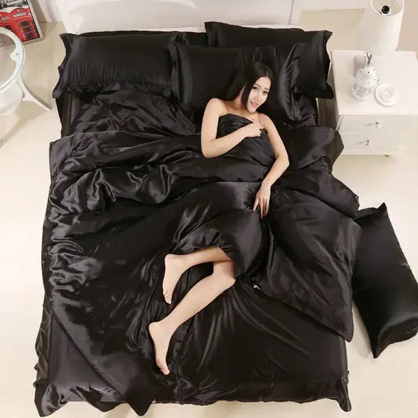 Silky soft satin duvet cover set, enhancing bedroom luxury & decor with its smooth, durable feel.
