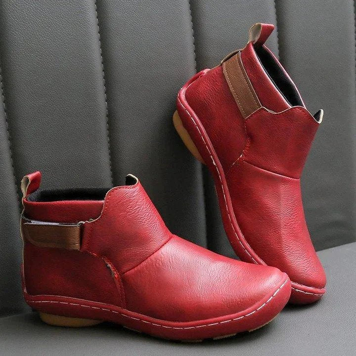 Women's stylish red orthopaedic walking shoes with advanced comfort and foot support for versatile everyday wear.