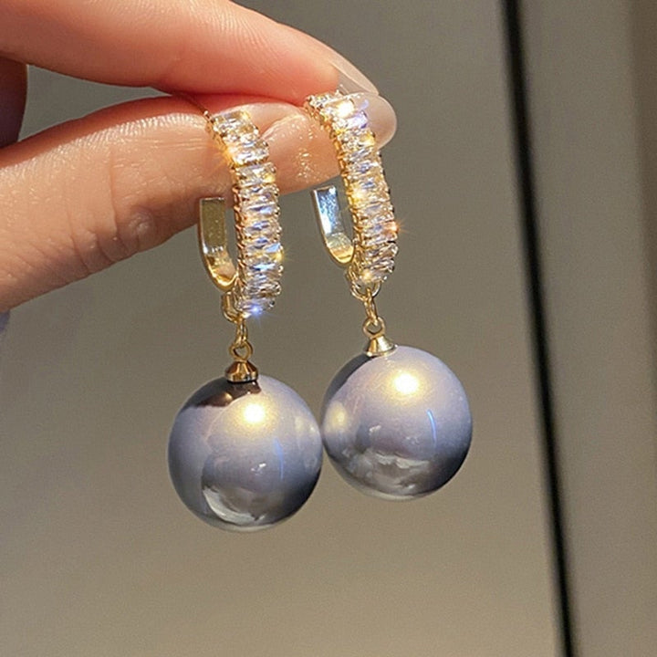 Exquisite pearl & zirconia drop earrings for women. Sparkle with these elegant luxury accessories, ideal for gifts.