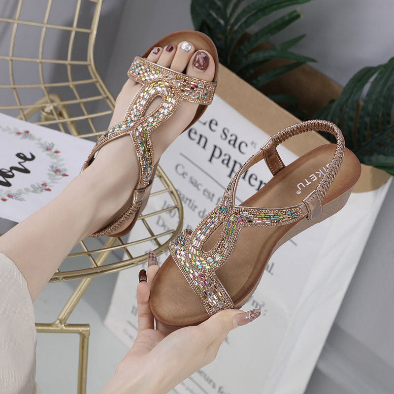 Elegant rhinestone wedge sandals for women, perfect for dressy or casual summer outfits.