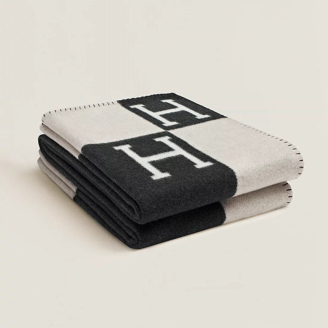 Luxury wool & cashmere plaid throw blanket in a classic plaid pattern, soft and warm for home decor.