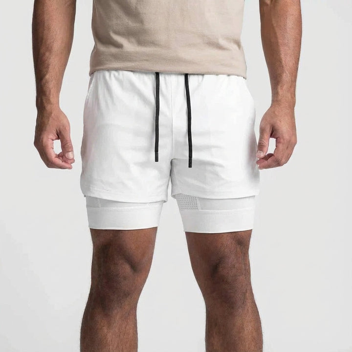 Side view of men's black 2-in-1 training shorts, showcasing inner compression layer.
