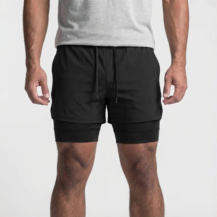 Rear view of men's black 2-in-1 training shorts, accentuating comfortable fit.