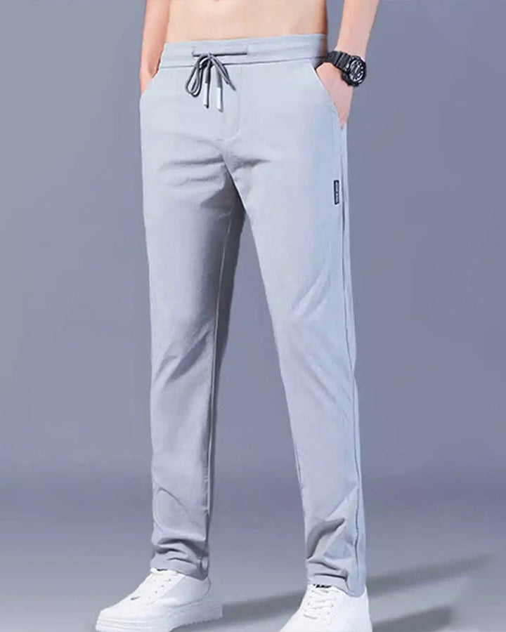Quick-dry men's stretch trousers, AeroFlex technology for ultimate comfort & performance.