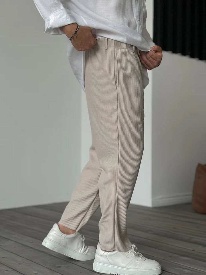 Close-up of men's luxury soft fabric trousers, highlighting comfortable texture & premium quality for men's fashion.
