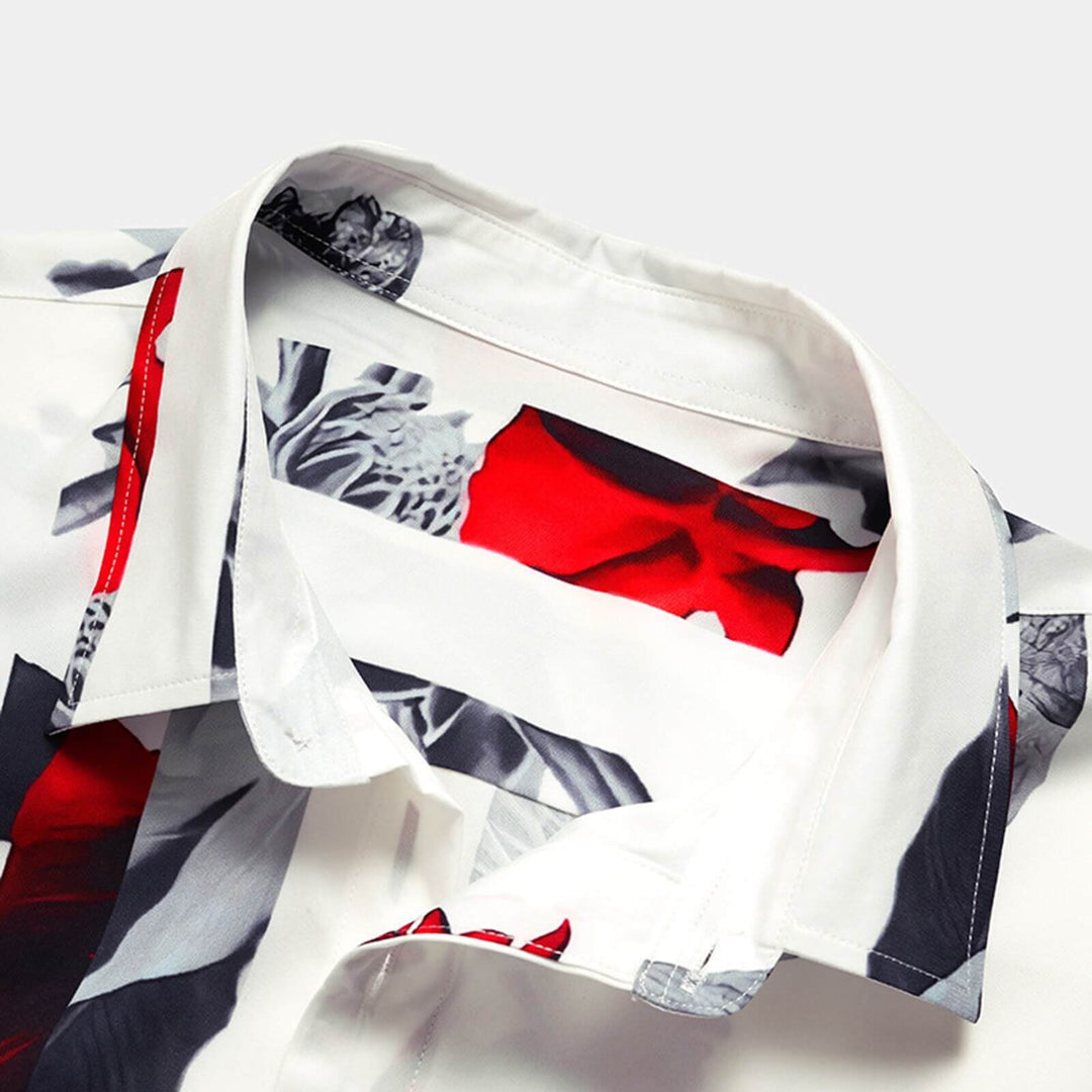 Close-up of men's tropical short sleeve shirt fabric, showing detailed AlohaVibes print and button placket.