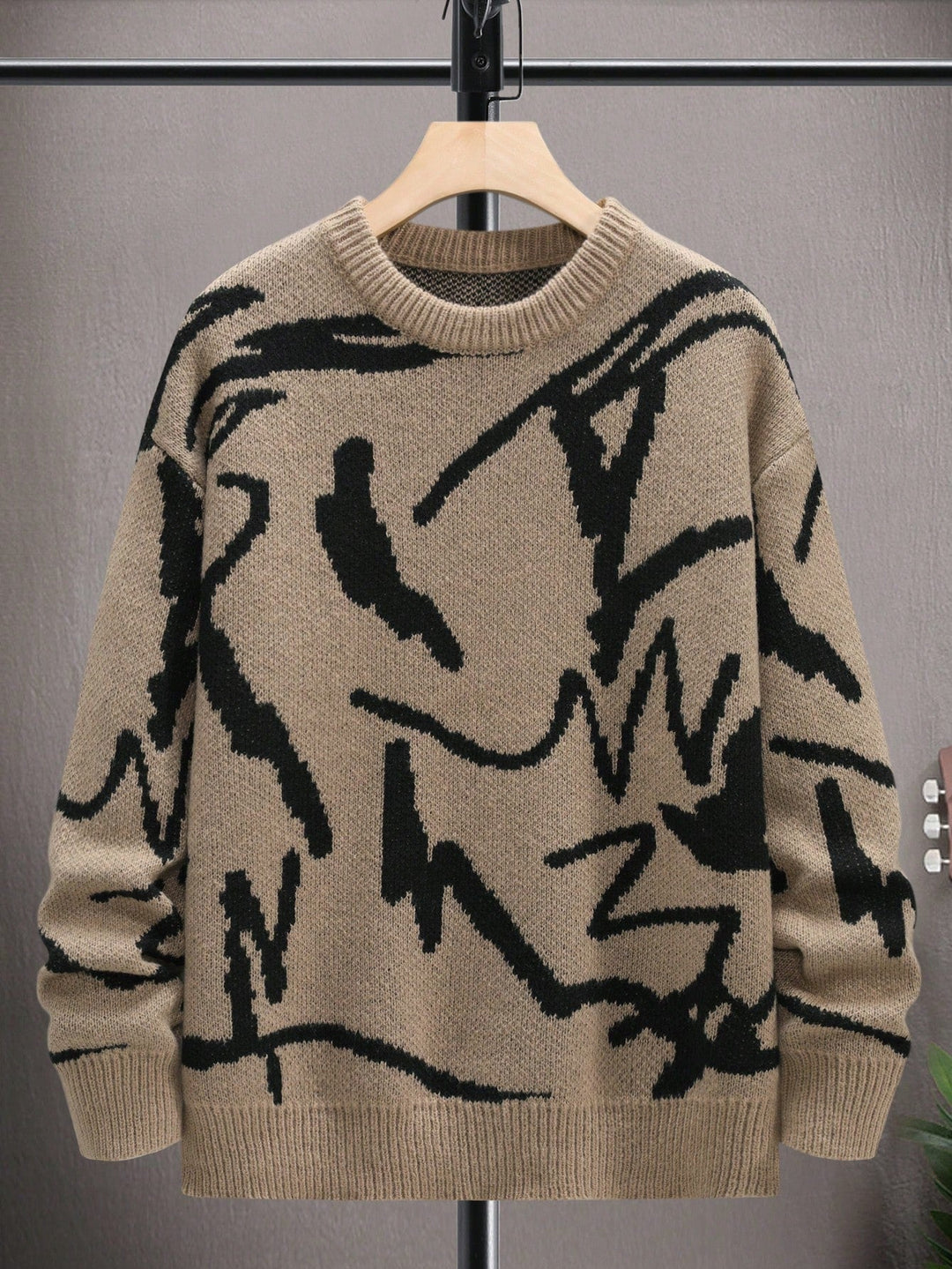 Front view of men's Arvid graphic print pullover sweater, showcasing the unique design.