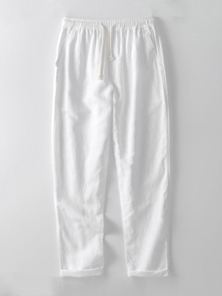 Gray modern men's slim fit linen co-ord set. Matching short sleeve top and ankle pants for smart casual style.