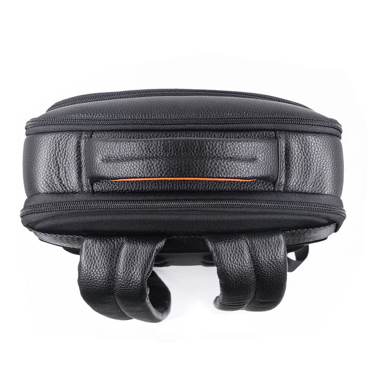 Close-up of a men's durable anti-theft leather backpack showing the biometric fingerprint lock detail.
