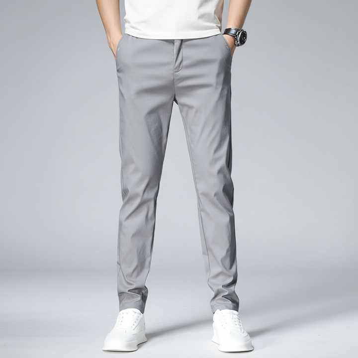 Back view of men's lightweight elastic slim fit pants, showcasing a modern and practical design.