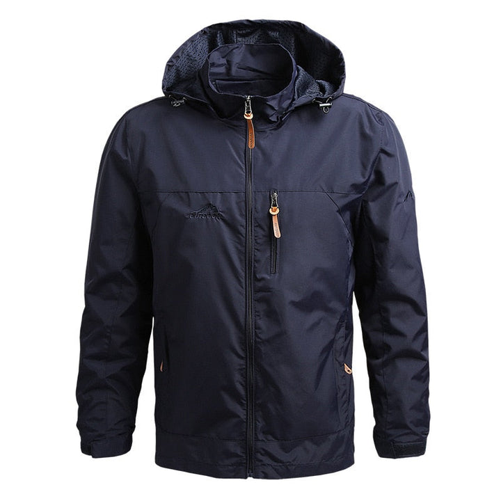 Durable men's hooded outdoor jacket for hiking & travel. Windbreaker & rain jacket for all-weather protection.