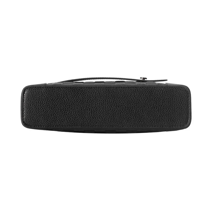 A man holding a sophisticated men's leather clutch with a prominent fingerprint lock feature.