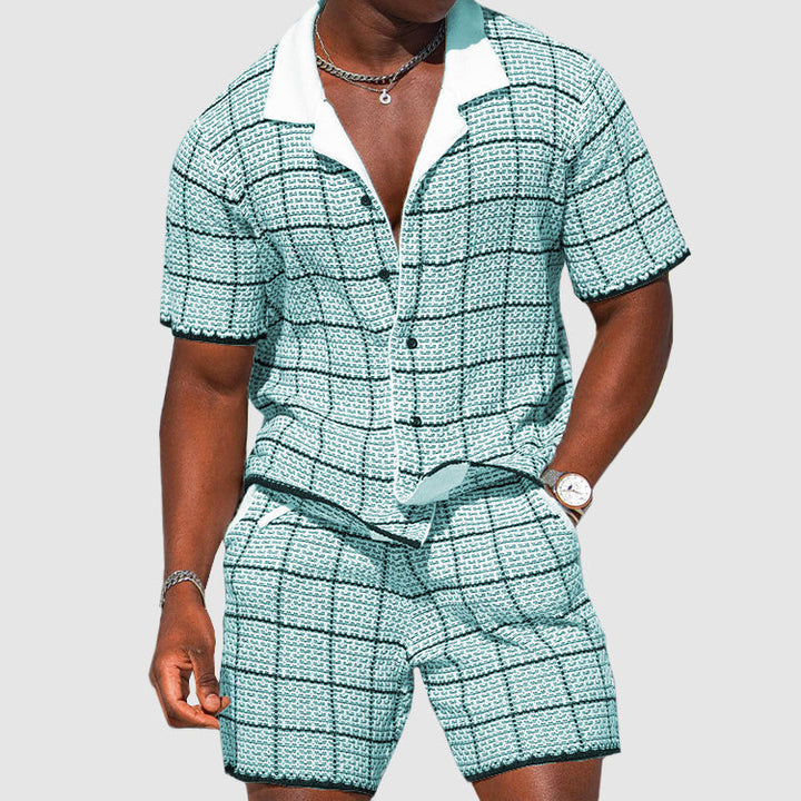 Men's blue & white checkered summer suit set with shorts. Stylish two-piece casual outfit for beach or resort wear.