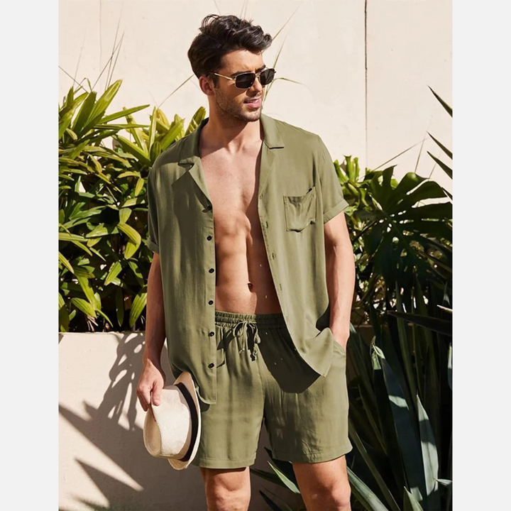 Man wearing a breathable men's linen summer shirt & pants set, ideal for a relaxed beach vacation.