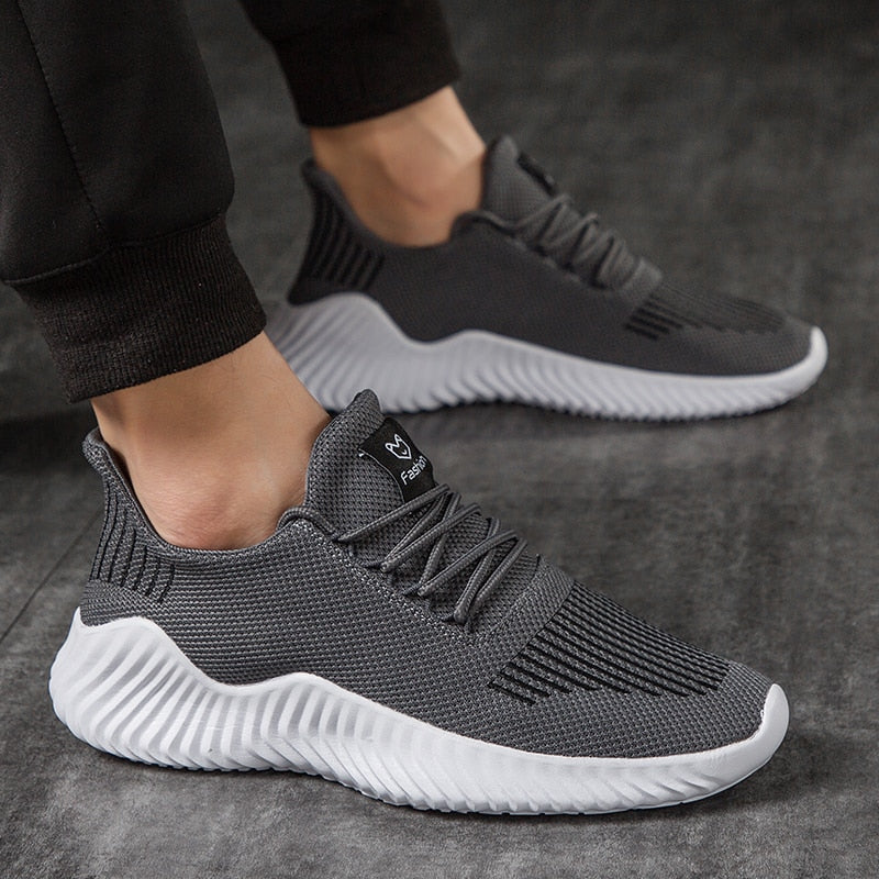 Comfortable men's athletic sneakers, featuring a breathable mesh upper for ultimate support.
