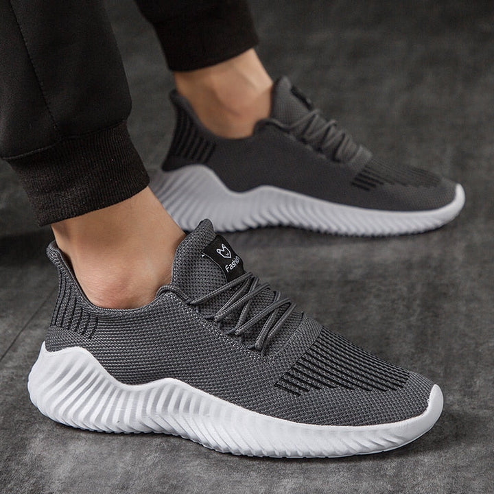 Comfortable men's athletic sneakers, featuring a breathable mesh upper for ultimate support.