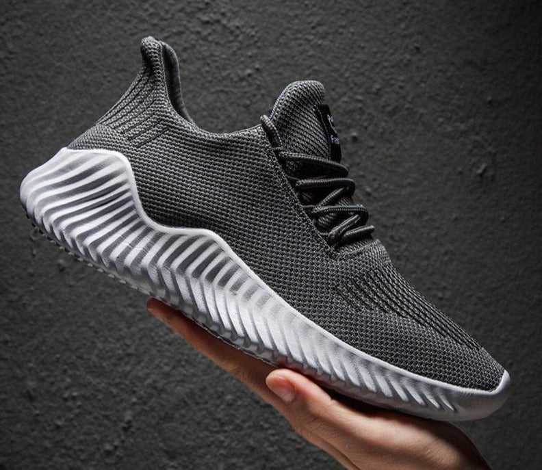 Men's comfortable breathable running sneakers, essential athletic footwear for training and active lifestyles.
